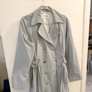 NWT Calvin Klein Trench Coat with Silver Tone Buttons and a Removable Belt.